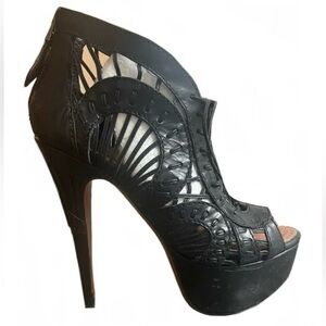Alaia Black Laser-Cut Platform Heels